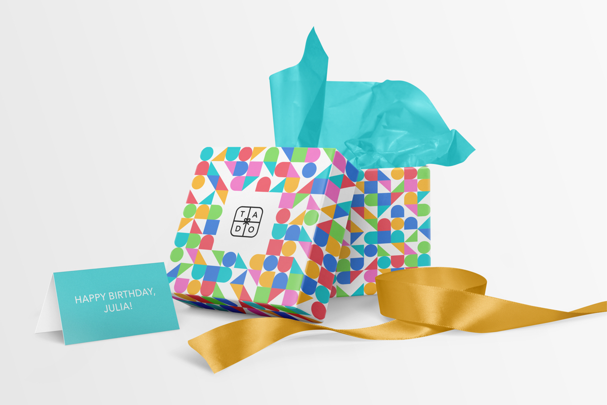 Tado header – Tado’s logo and visual language on gift box